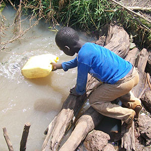 boy-gathering-water-cir