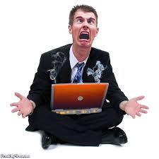 Man in pain, sitting with a steaming hot laptop on his lap
